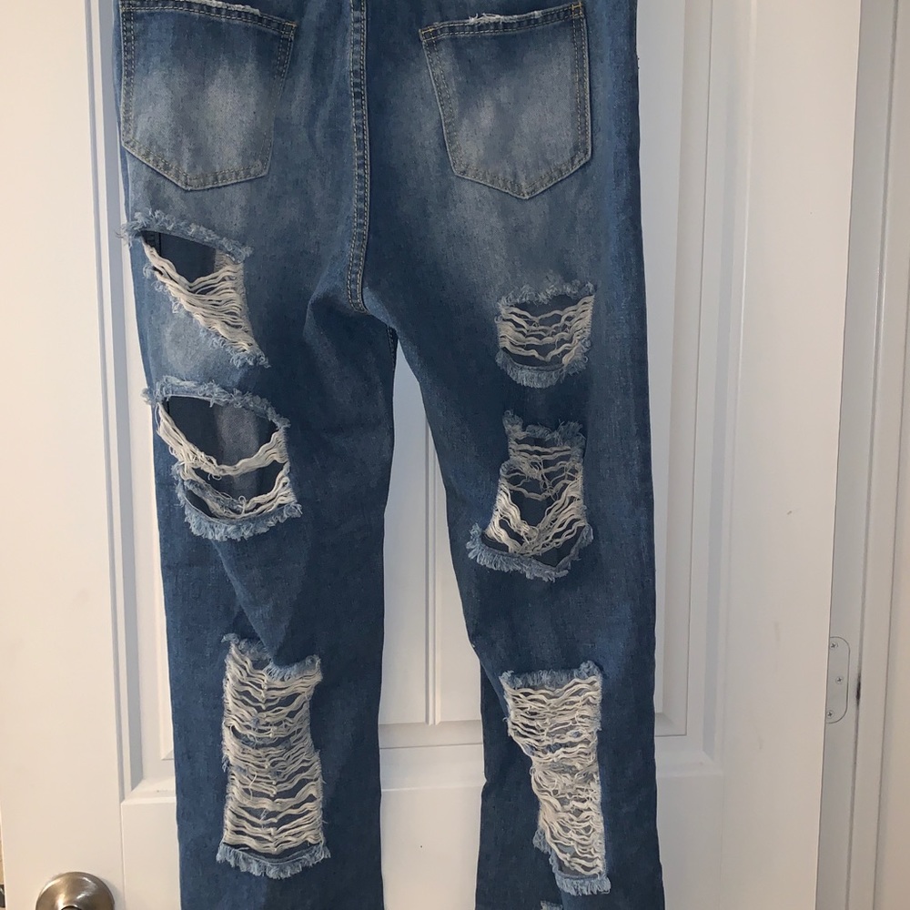 Distressed jeans.